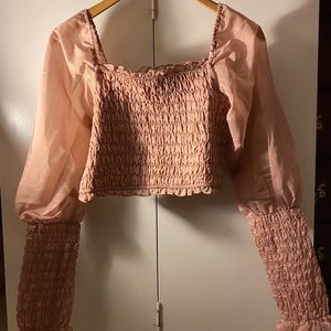 Short blush ruffled top